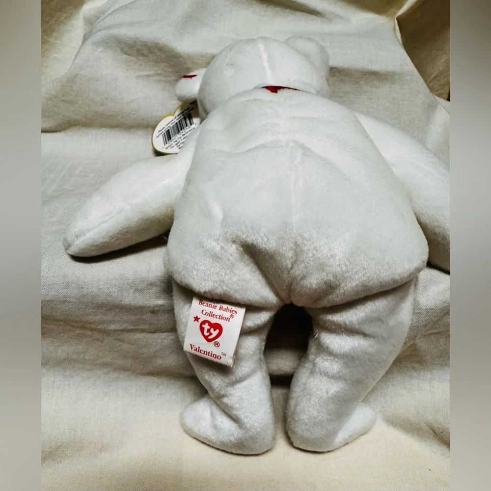 Valentino RARE Beanie, with Brown Nose, and tag errors - Picture 2 of 3